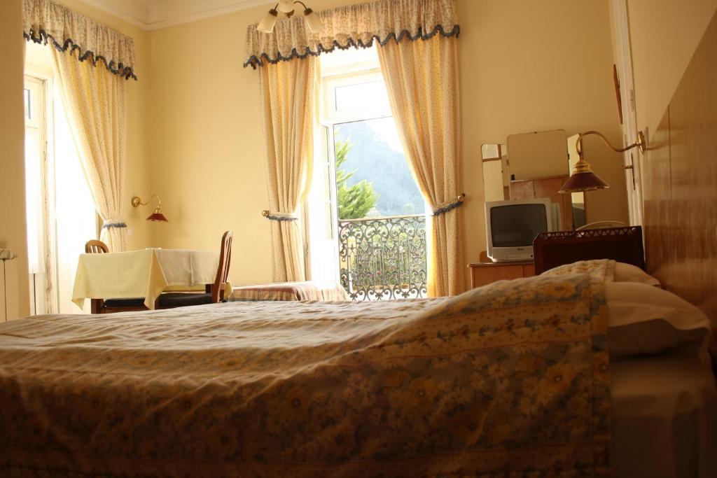 Quarto Triplo com Vista do Jardim